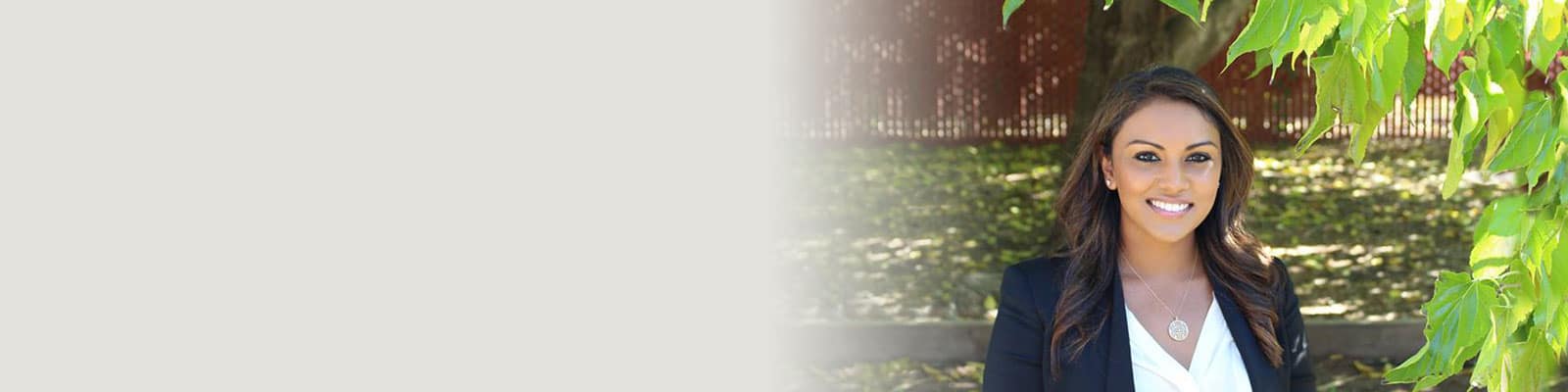 University Care monument smiling staff member